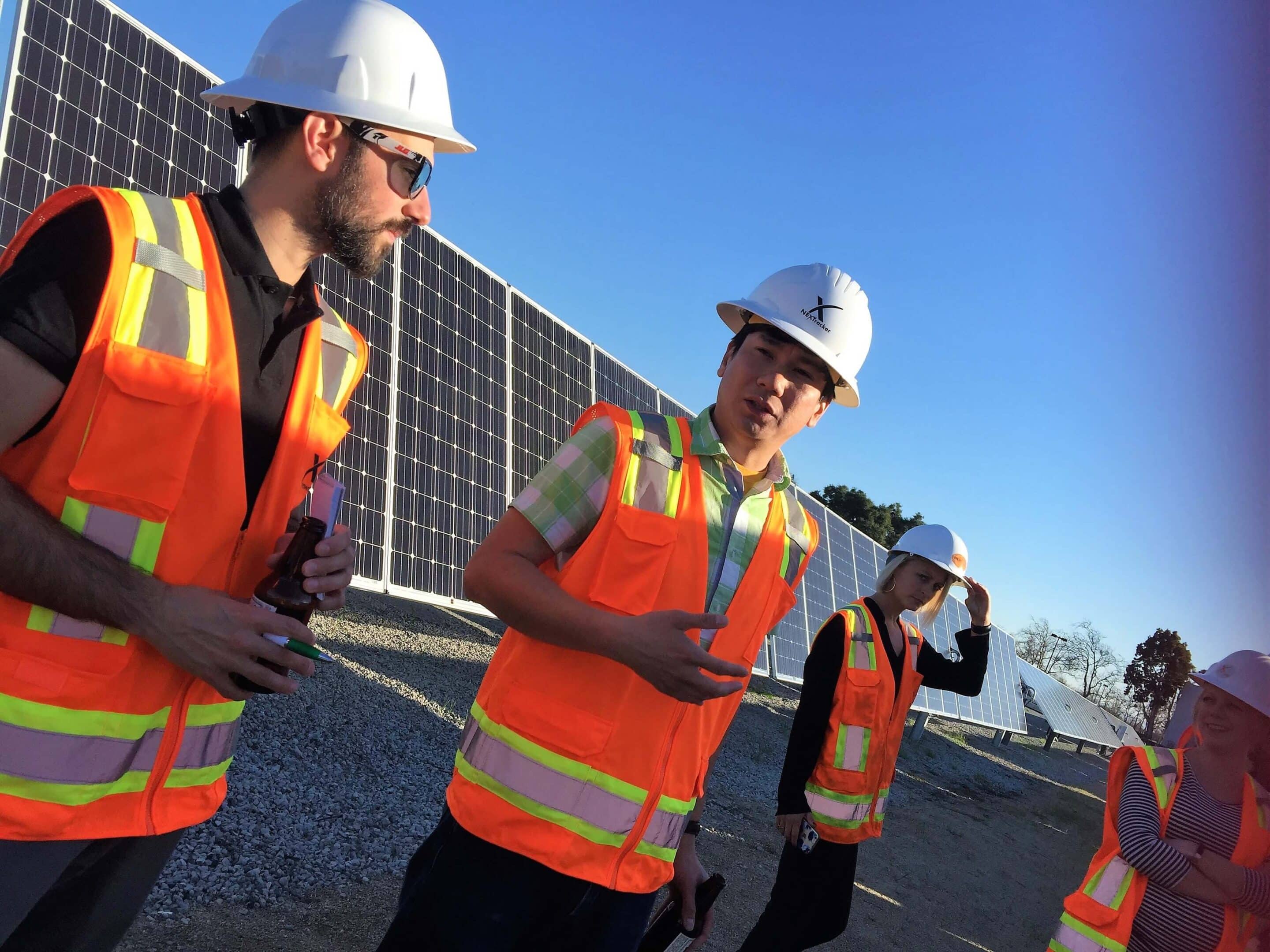 Construction Workers Discussing Together