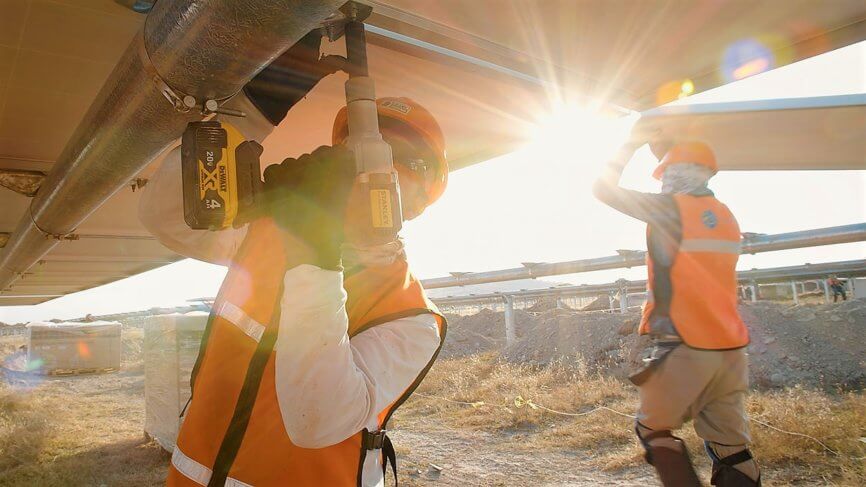 Construction Workers Setting the Solar Panels