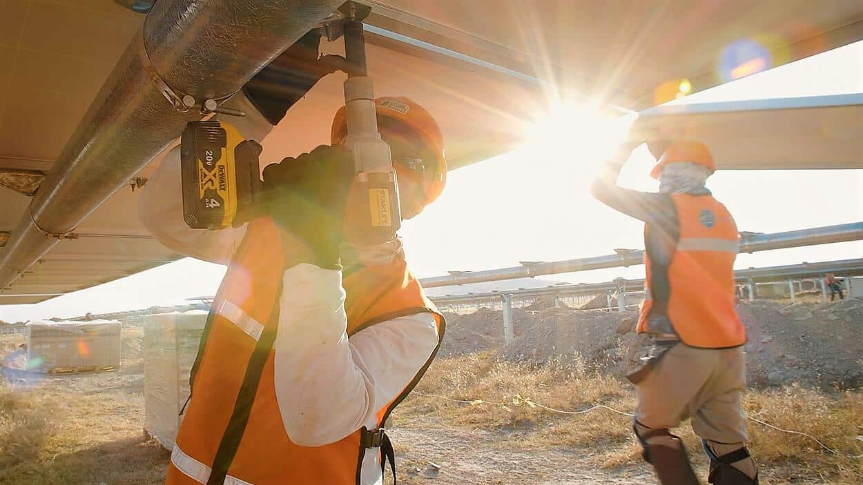 Construction Workers Setting the Solar Panels